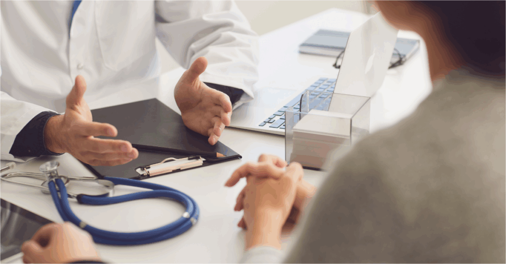 Photo of a medical expert giving advice to a patient.